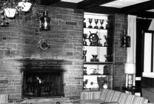 Fireplace and trophy case in the lounge of the clubhouse 1966 to 1991